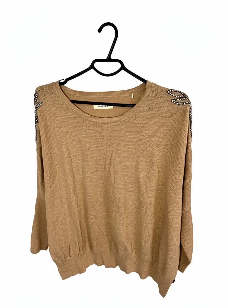Sweater beige con ordado