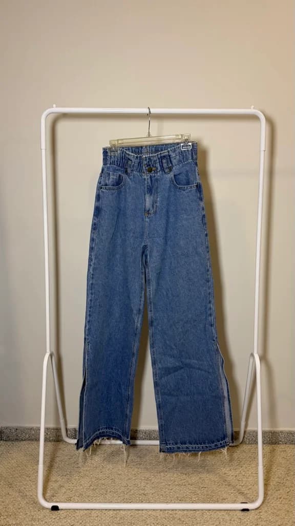 Jean Renner Bluesteel wide leg con abertura a los costados