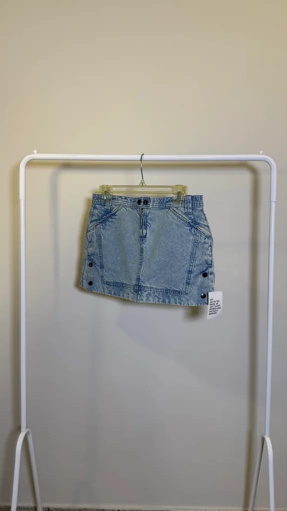 Pollera de jean botones al costado